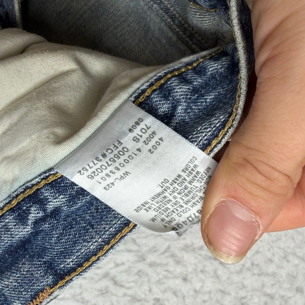 Y2K Levis 557 Relaxed Bootcut Jeans Mens 34x34 Light Wash Distress Denim FADE